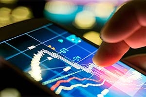 tablet showing financial indicators