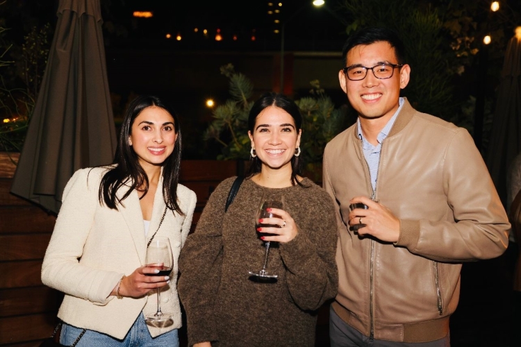 3 MUFG Employees holding wine